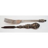 Victorian silver dessert fork with figural terminal by George Maudsley Jackson, London 1891,