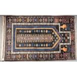 A Baluch prayer rug with hands at the corners, 130cm x 79cm