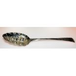 George III silver berry spoon with foliate and C-scroll engraved handle, maker William Eley & Fearn,