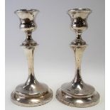 Pair of George V silver weighted candlesticks, maker S.B & B.L.D., Chester 1927, height 15cm.