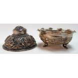 Eastern white metal sugar bowl embossed and engraved with buildings amongst trees; together with a