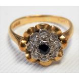 18ct hallmarked gold diamond and sapphire cluster ring, the central sapphire of 0.07ct spread