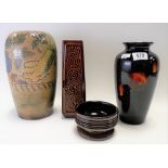 Royal Doulton Brangwyn ware vase, height 23cm; together with three modern Poole Pottery vases.
