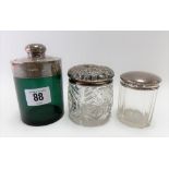 Early 20th Century green glass silver mounted, Chester 1916; together with two silver lidded