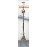 Victorian brass standard oil lamp, converted to electricity, the oil reservoir within foliate scroll