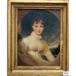 EARLY 19TH CENTURY BRITISH SCHOOL Half length portrait of a seated young woman with white dress