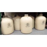 Five Doulton & Co. advertising stoneware storage jars for 'Berk Chemicals', with impressed marks,