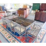 Good 20th Century cast iron gothic dining table with set of nine chairs including two carvers