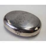 Victorian silver oval snuff box, the hinged lid with engraved crest and monogram, maker S.I.LD,