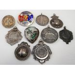 Seven various silver fob medals together with three silver badges (10)