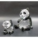 Two Swarovski clear and flint crystal pandas, height of largest 8cm (2).