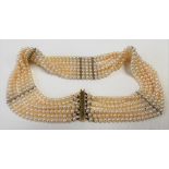 Good gold & pearl bead choker, the seven rows of pearls separated by six gold bars & with a gold