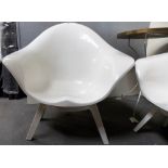 Pair of Mid Century moulded white painted tub chairs upon four white painted supports