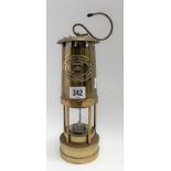 Brass miner's lamp by E Thomas & Williams, Aberdare, Wales, Cambrian no. 229861, height 25cm.