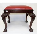 Georgian style mahogany stool, the rectangular top with upholstered inset over foliate scroll carved