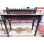Victorian oak carved side table with single carved frieze drawer & on bobbin turned supports