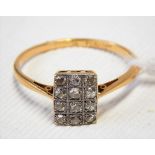 18ct gold platinum diamond set cluster ring, the rectangular head set with twelve small diamonds