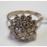 Impressive 18ct white gold diamond cluster ring, set with nineteen diamonds of 0.10ct spread approx,