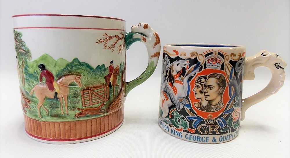 George VI Coronation mug designed by Dame Laura Knight R.D. No. 814375/6; together with a Wedgwood