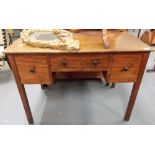 Gordon Russell Cuban mahogany cedar lined writing table, the moulded top over three drawers with