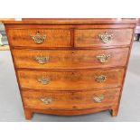 George III mahogany chevron strung bow front chest of two short over three long graduated drawers