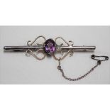 White and yellow metal bar brooch set with an oval amethyst, weight 6.2g approx.