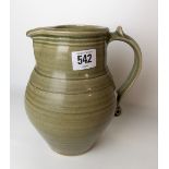 St Ives Leach Studio Pottery celadon glazed jug, impressed circular pottery seal, height 20cm.