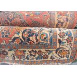 Two similar Persian wool rugs, width 140cm.