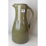 Early St Ives Leach Studio Pottery large olive glazed jug, with cylindrical flared body with incised