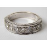 18ct white gold diamond set nine stone half eternity ring, the slightly graduated brilliant cut