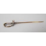 Gold tie pin in the form of a naval officer's sword with white enamelled decoration, length 7.5cm,