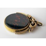 19th Century yellow metal bloodstone and set with bloodstone and carnelian, height excluding base