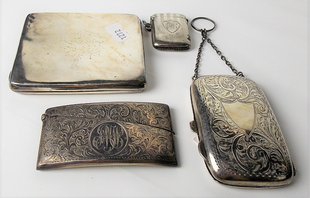 George V silver foliate scroll engraved cigarette case with suspension chain, Birmingham 1919;