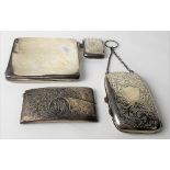 George V silver foliate scroll engraved cigarette case with suspension chain, Birmingham 1919;