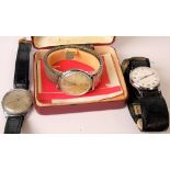 A gents steel cased Saga electric wristwatch upon expanding bracelet within original box with