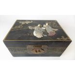 Early 20th Century Chinese black lacquer hinge-lidded jewellery box, the lid hardstone, mother of