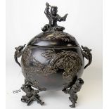 Japanese bronze lidded Koro, the dome lid cast with a seated boy and with pierced clouds, the base