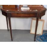 George III mahogany boxwood and ebony strung tea table with canted corners and raised on square
