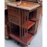 Edwardian inlaid mahogany revolving bookcase with three drawers, height 89.5cm