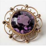 9ct hallmarked amethyst circular wirework brooch, diameter 27mm, weight overall 7g approx.