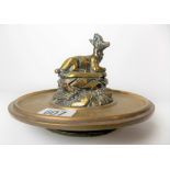 Early 20th Century brass inkwell, the hinged lid cast as a mountain goat on a rock & on a circular