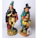 Royal Doulton figure 'The Mask Seller', no. HN2103; together with another Royal Doulton figure '