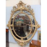 Impressive 19th Century carved wood and gesso parcel gilt and cream painted oval mirror with foliate