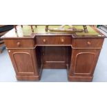 Victorian mahogany twin pedestal desk, the break front top with green leather gilt tooled inset over