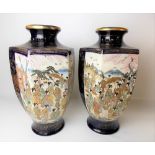 Pair of Japanese Satsuma cobalt blue ground hexagonal section baluster vases, both painted with