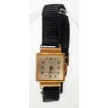18ct gold cased ladies manual wind wristwatch, the silvered dial with Arabic numerals & signed