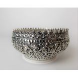 19th Century Indian silver small foliate scroll embossed bowl, the interior stamped D.H BHUJ,