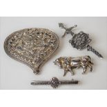 Four silver hallmarked brooches, one in the shape of a bull, maker S.B & S, weight 1.60oz approx.