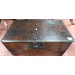 17th Century oak rectangular hinge-lidded box with iron lock, the hinged lid engraved EM, width