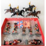 W. Britain set of seven Highland Infantry figures; together with a set of five 4th Queen's Own